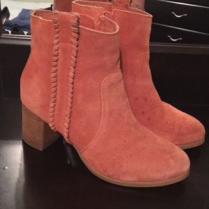 Orange suede booties